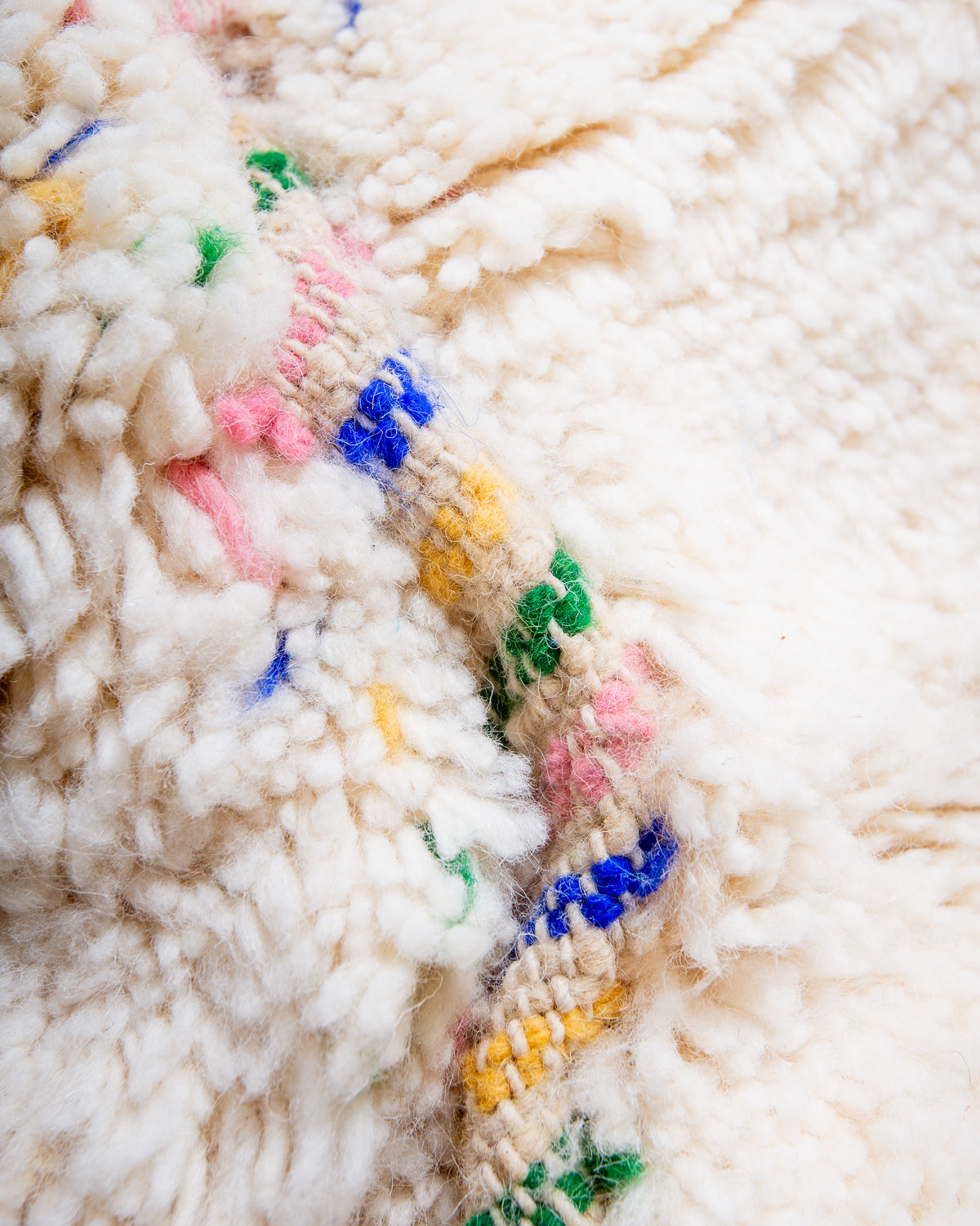 Modern, designer, handcrafted Berber rug from Morocco. Beniourain carpet with beautiful colours and patterns and fluffy wool texture.
